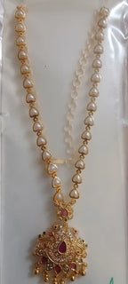 Elegant Pearl Heart Necklace with Antique Gold Pendant