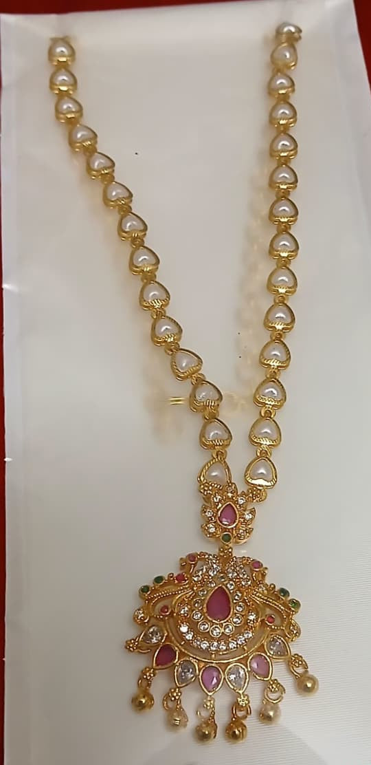 Elegant Pearl Heart Necklace with Antique Gold Pendant